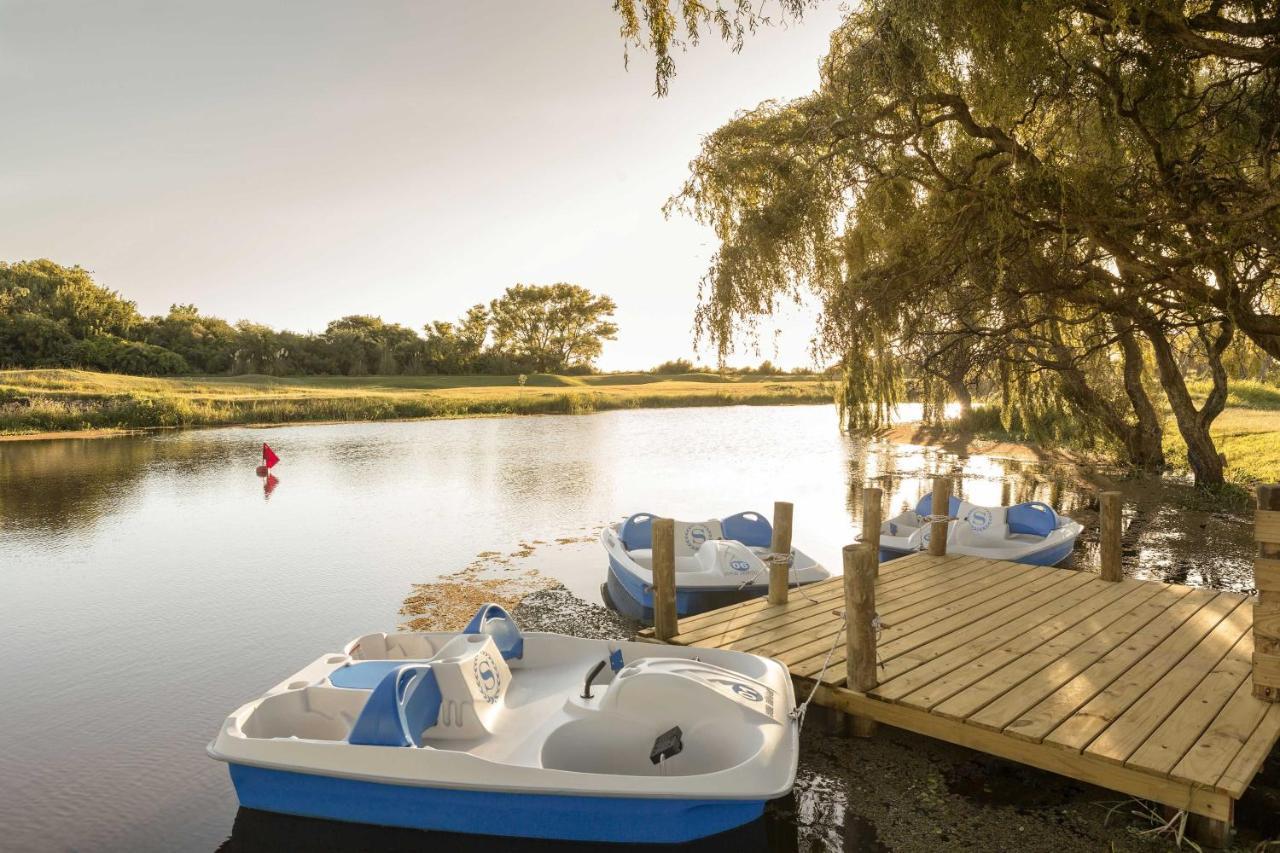 Sheraton Colonia Golf & Spa Resort Колонія-дель-Сакраменто Екстер'єр фото The lake at the park