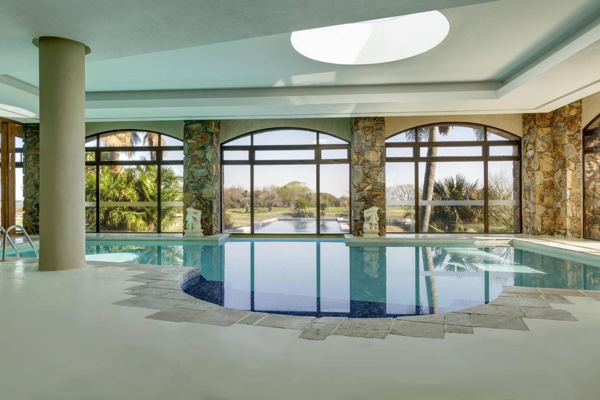 Sheraton Colonia Golf & Spa Resort Колонія-дель-Сакраменто Екстер'єр фото The swimming pool at the hotel